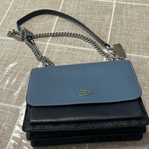 Used once coach shoulder bag blue tones w silver straps